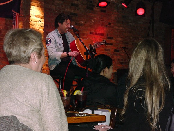 Kasim Sulton at The Bitter End, NYC with his mother in the foreground - 03/16/02